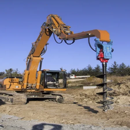 Foreuse montée sur une excavatrice pour creuser des trous dans le sol
